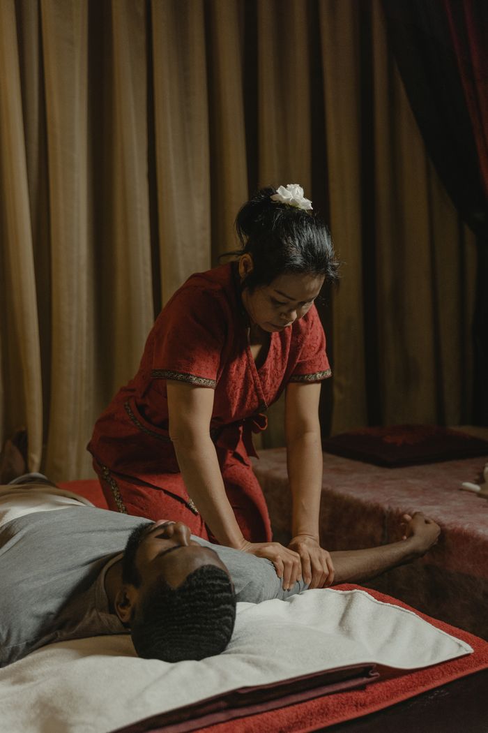 The Art of Drawing Readers In: Your attractive post title goes here A relaxing massage therapy session in a serene spa setting with professional masseur.