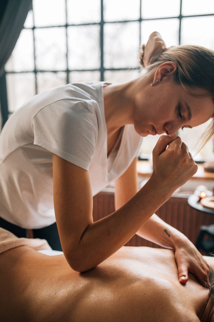 Mastering the First Impression: Your intriguing post title goes here A relaxing massage therapy session indoors with a focus on body care and self-care.